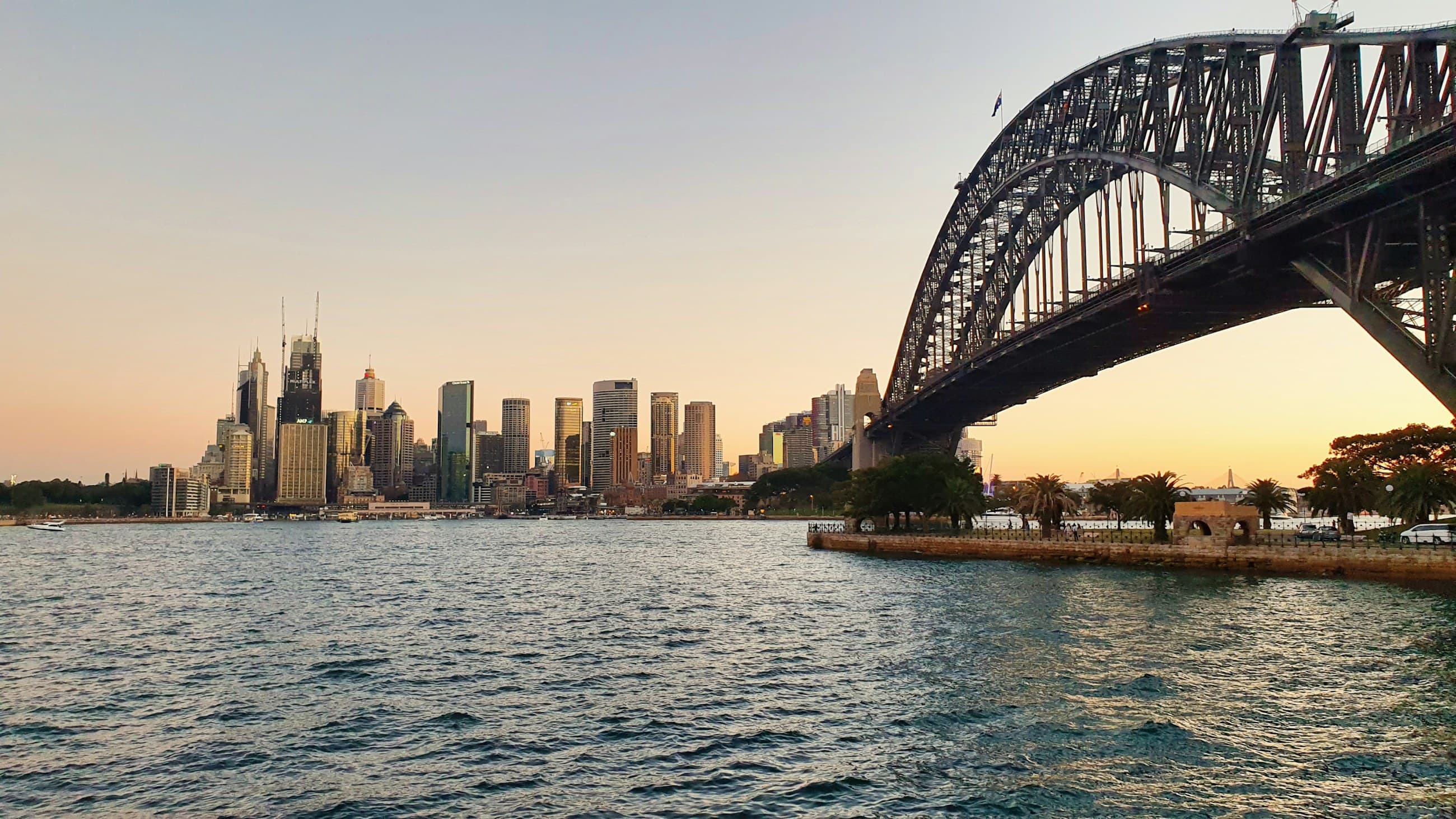Sydney CBD skyline and Harbour Bridge at sunset
